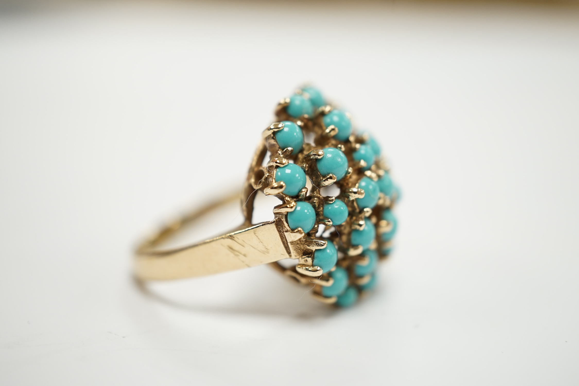 A 9ct gold and turquoise bead cluster set dress ring, size S, gross weight 6.3 grams.